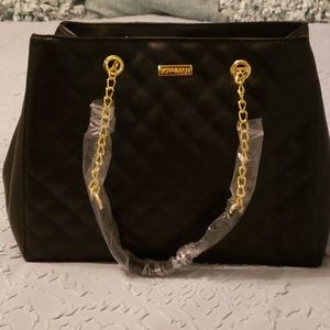 Iman  preowned quilted purse